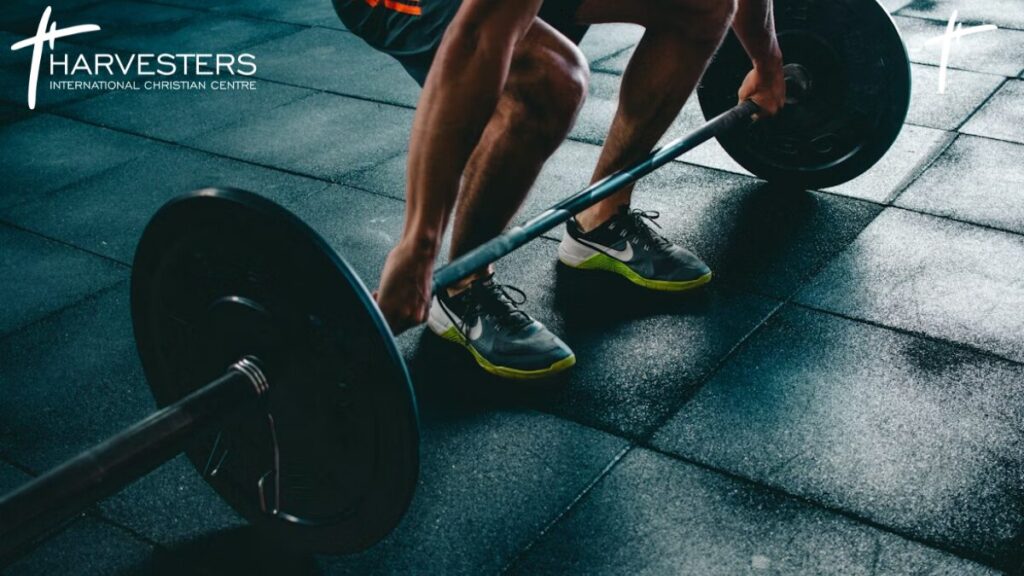 Spiritual Disciplines for the Christian Life: Picture of a man lifing weight to as an analogy for spiritual discipline.